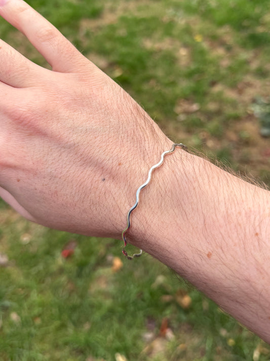 Wavy silver bangle